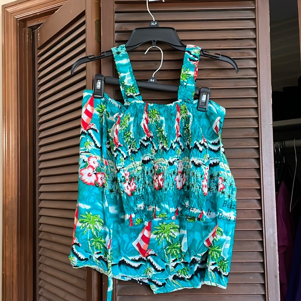 Beach outfit or swim suit coverup. Women’s free size.
